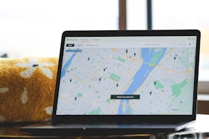 a laptop with a map on the screen