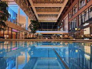 Interior shot of Itaquá Plaza showing clean, spacious walkways and vibrant store fronts.