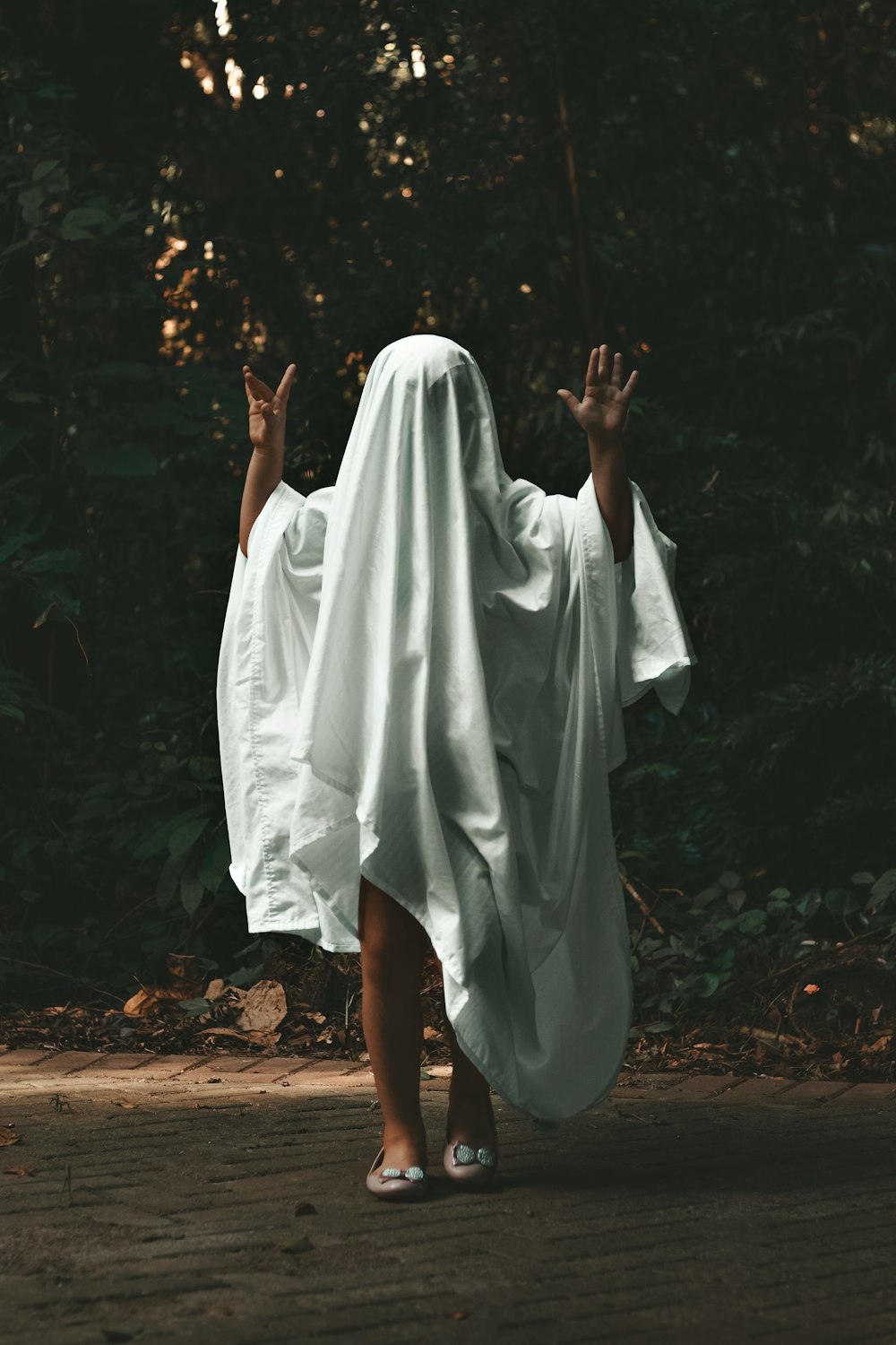 a person wearing a white robe