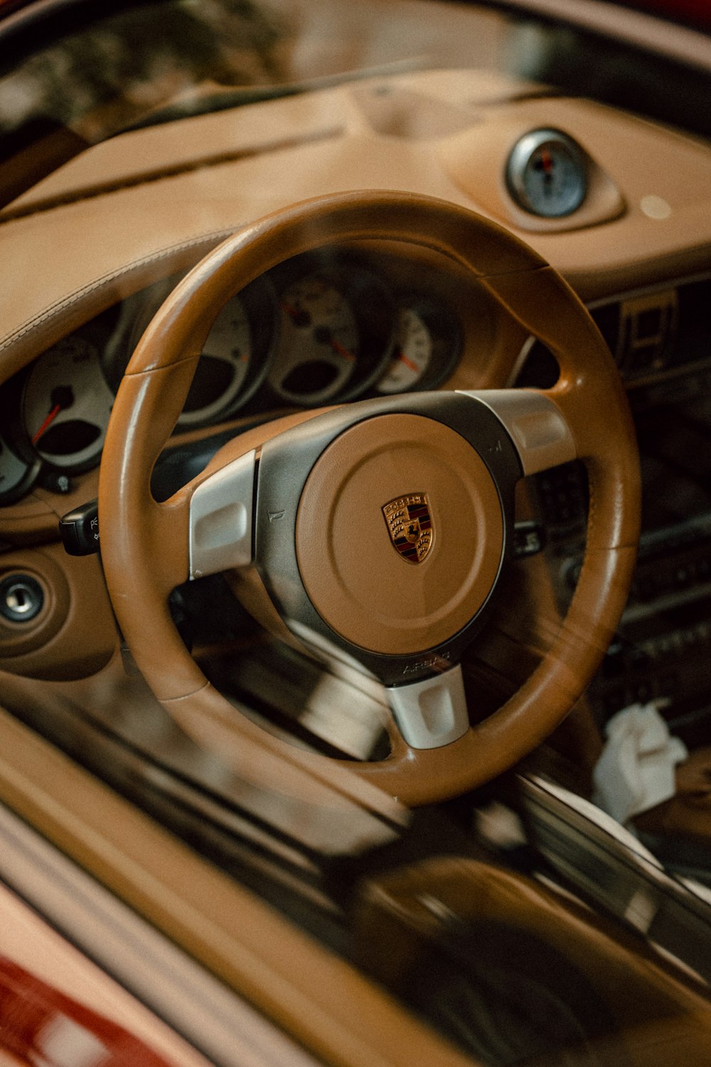 a steering wheel and dashboard of a car