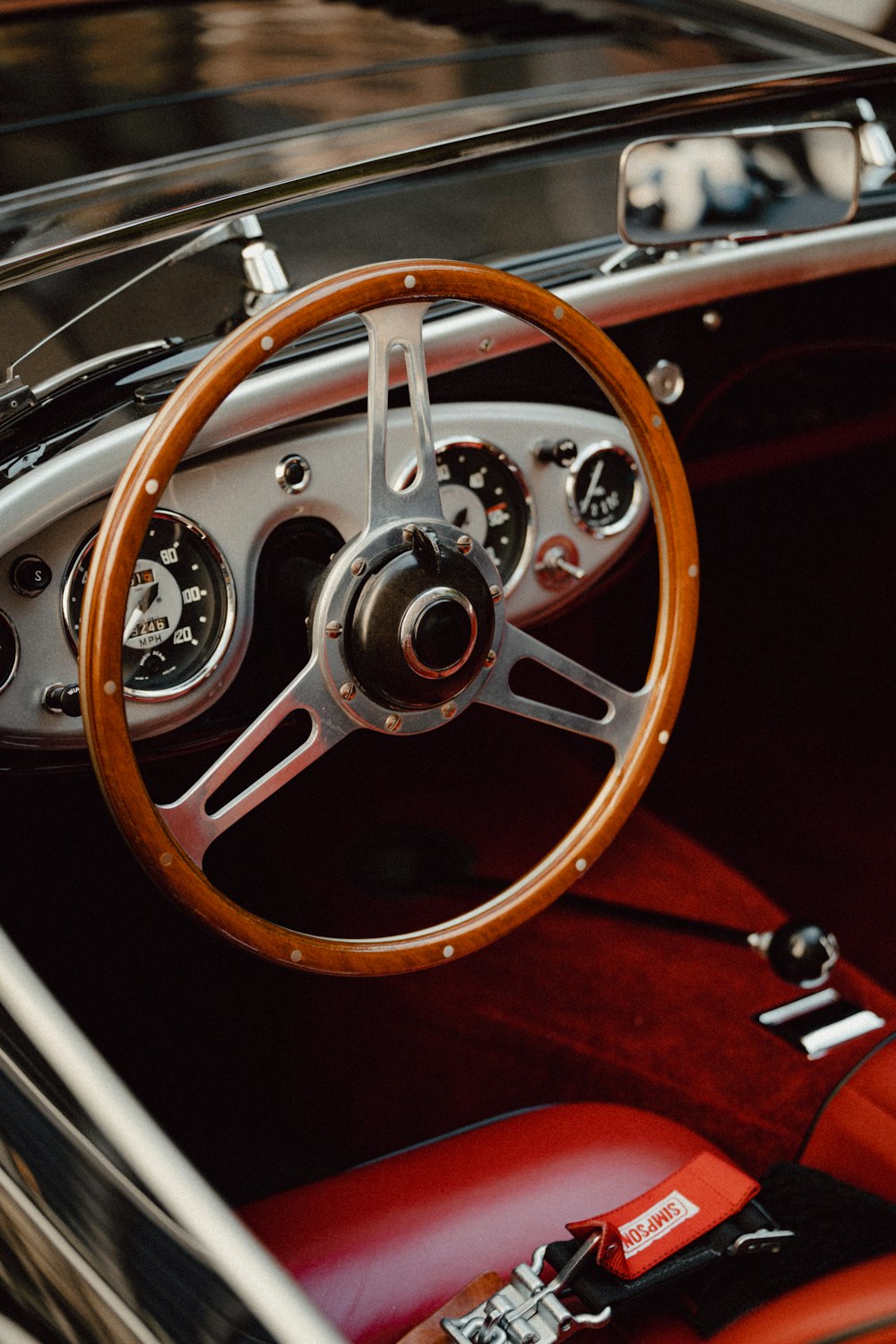 a steering wheel and dashboard of a car