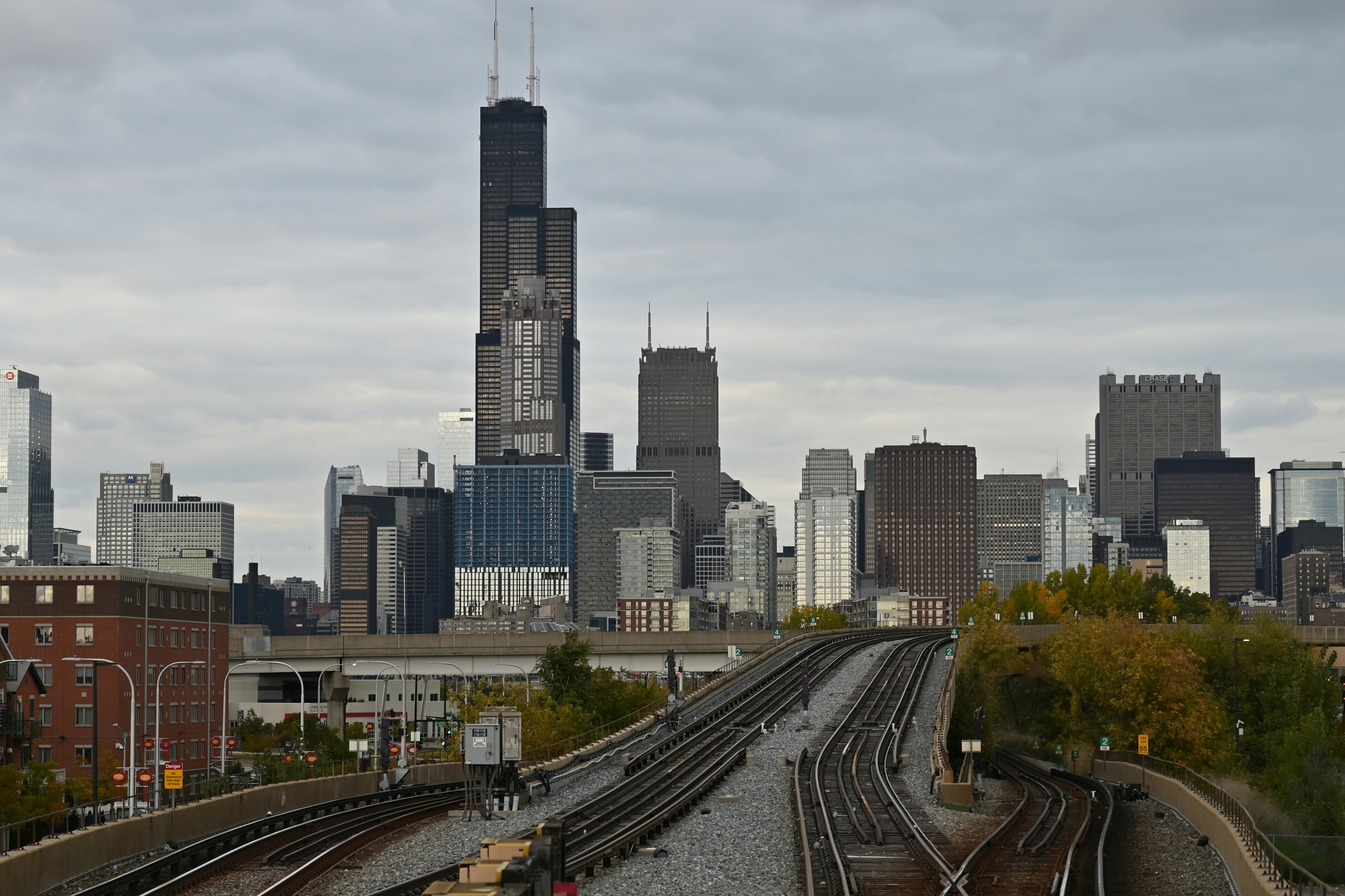 a city with train tracks, 