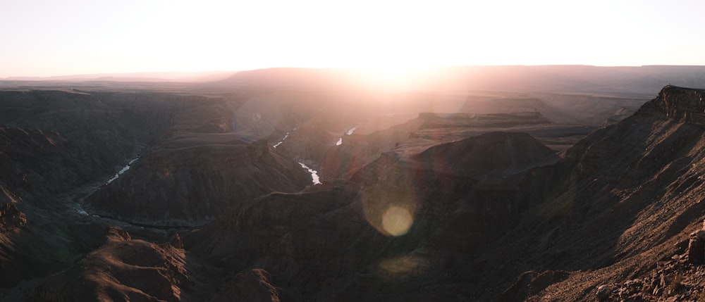 a large canyon with a river running through it