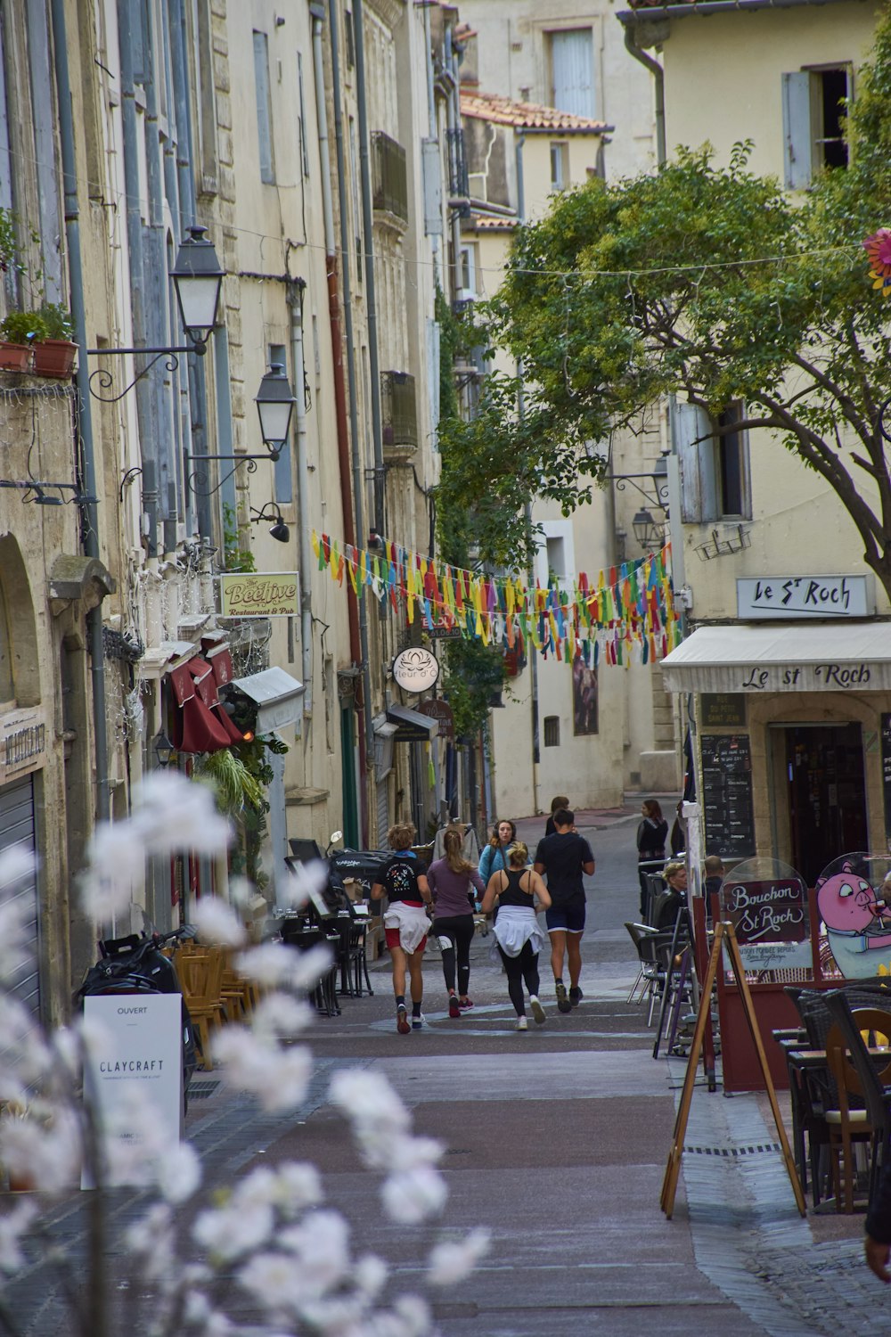 people walking down a street