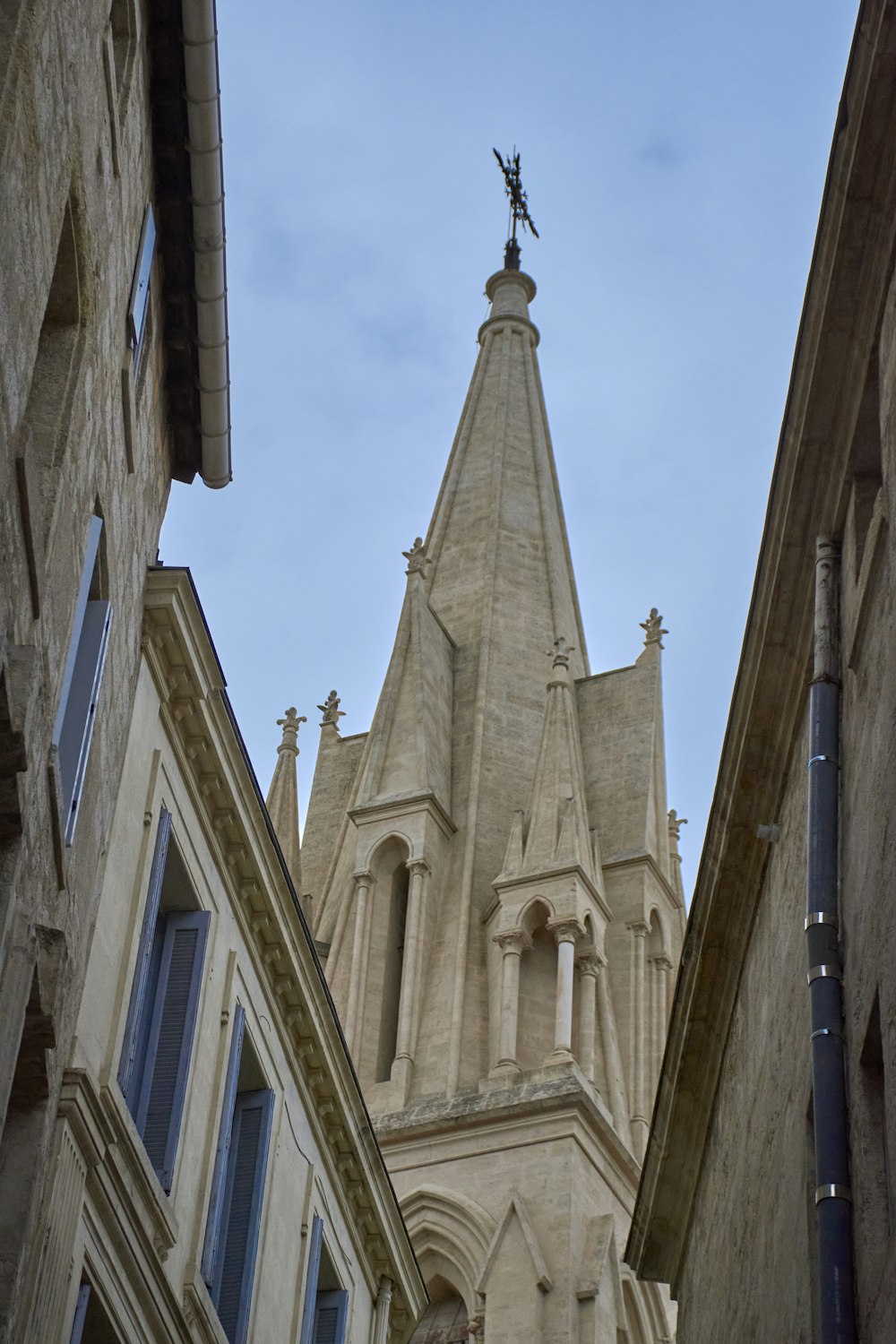 a tall building with a cross on top