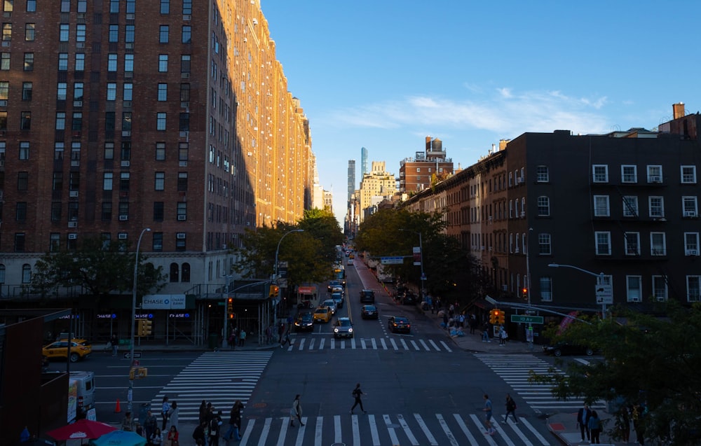 a street with cars and buildings