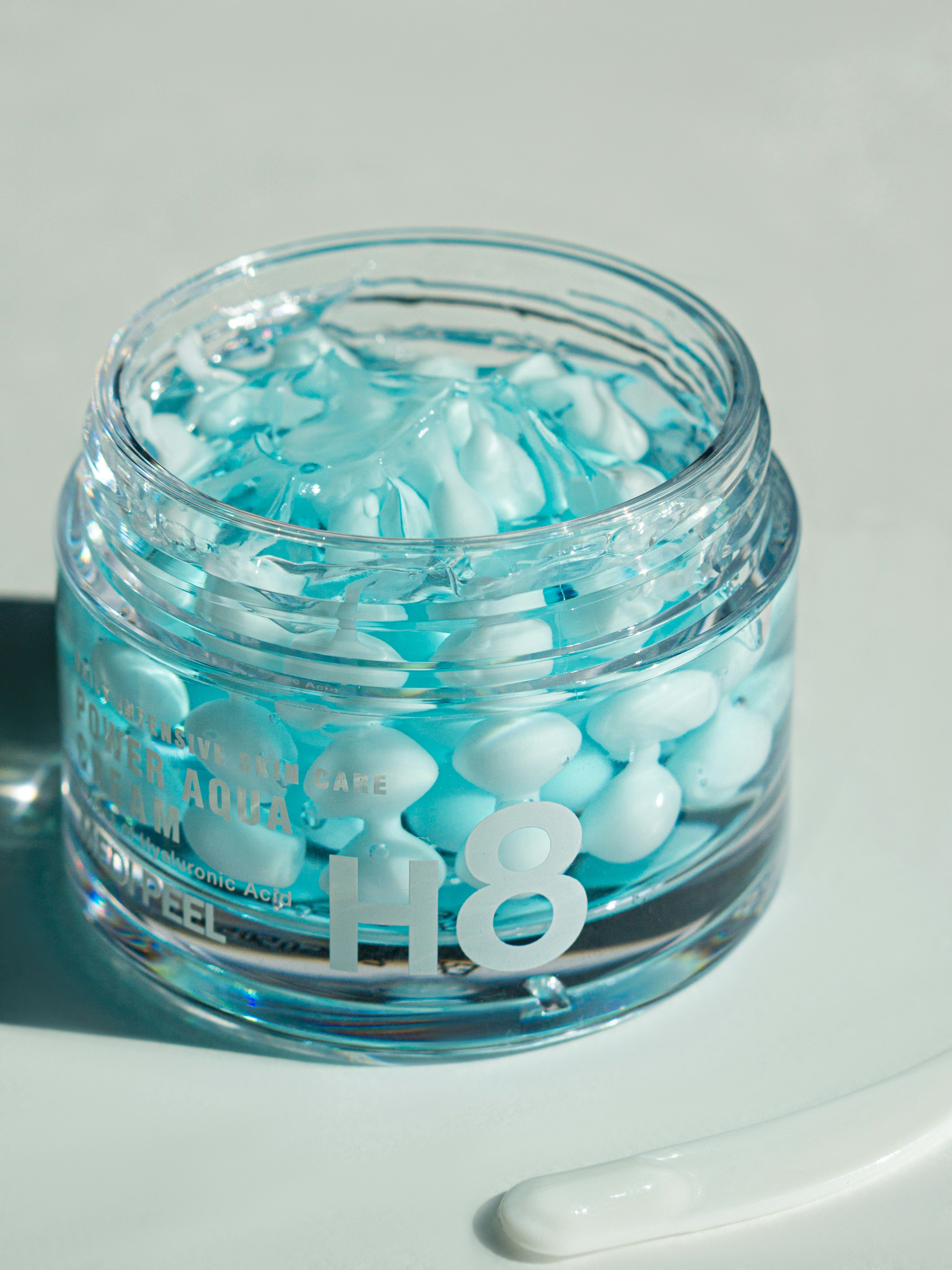 a close-up of a glass bowl with a few balls inside