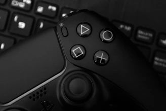 a remote control on a keyboard