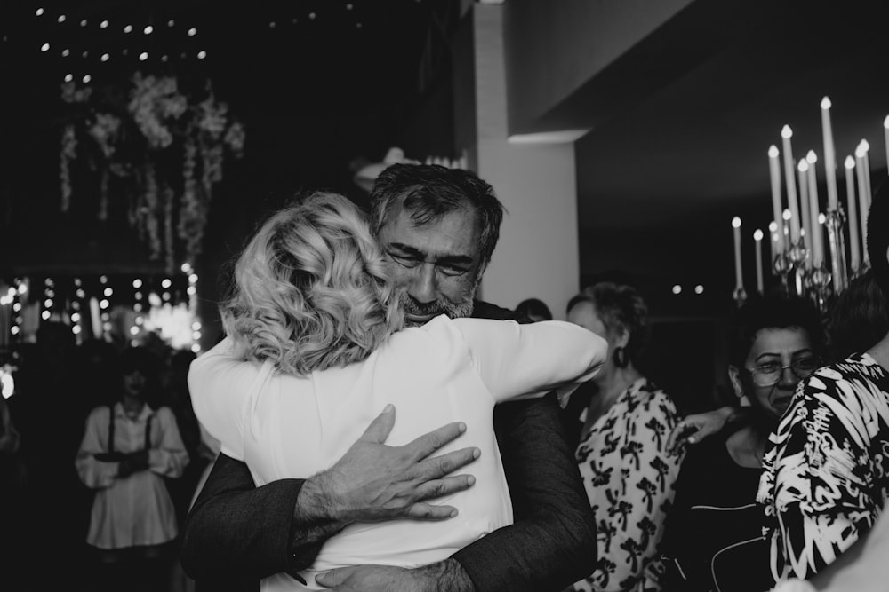 a man and woman hugging