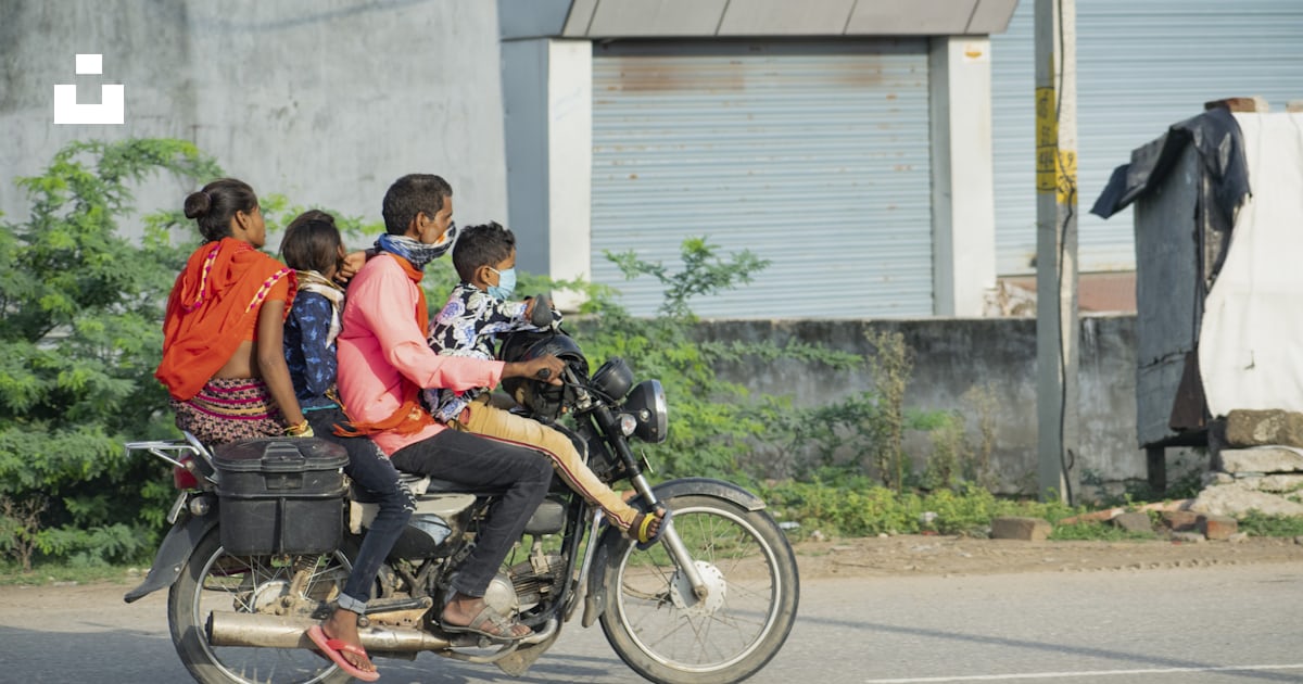 A group of people ride on a motorcycle photo – Free Jaipur Image on ...