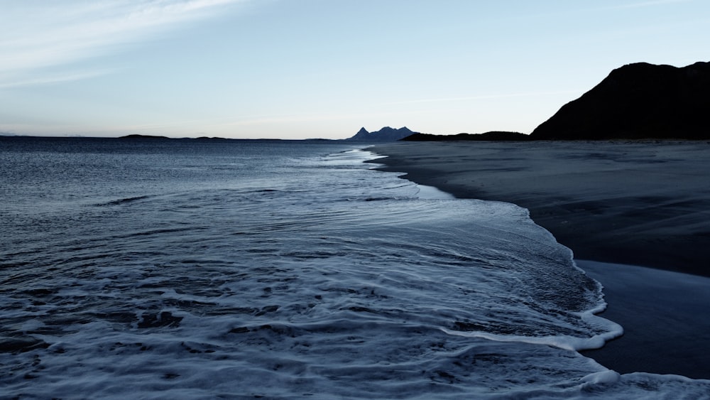 a body of water with waves