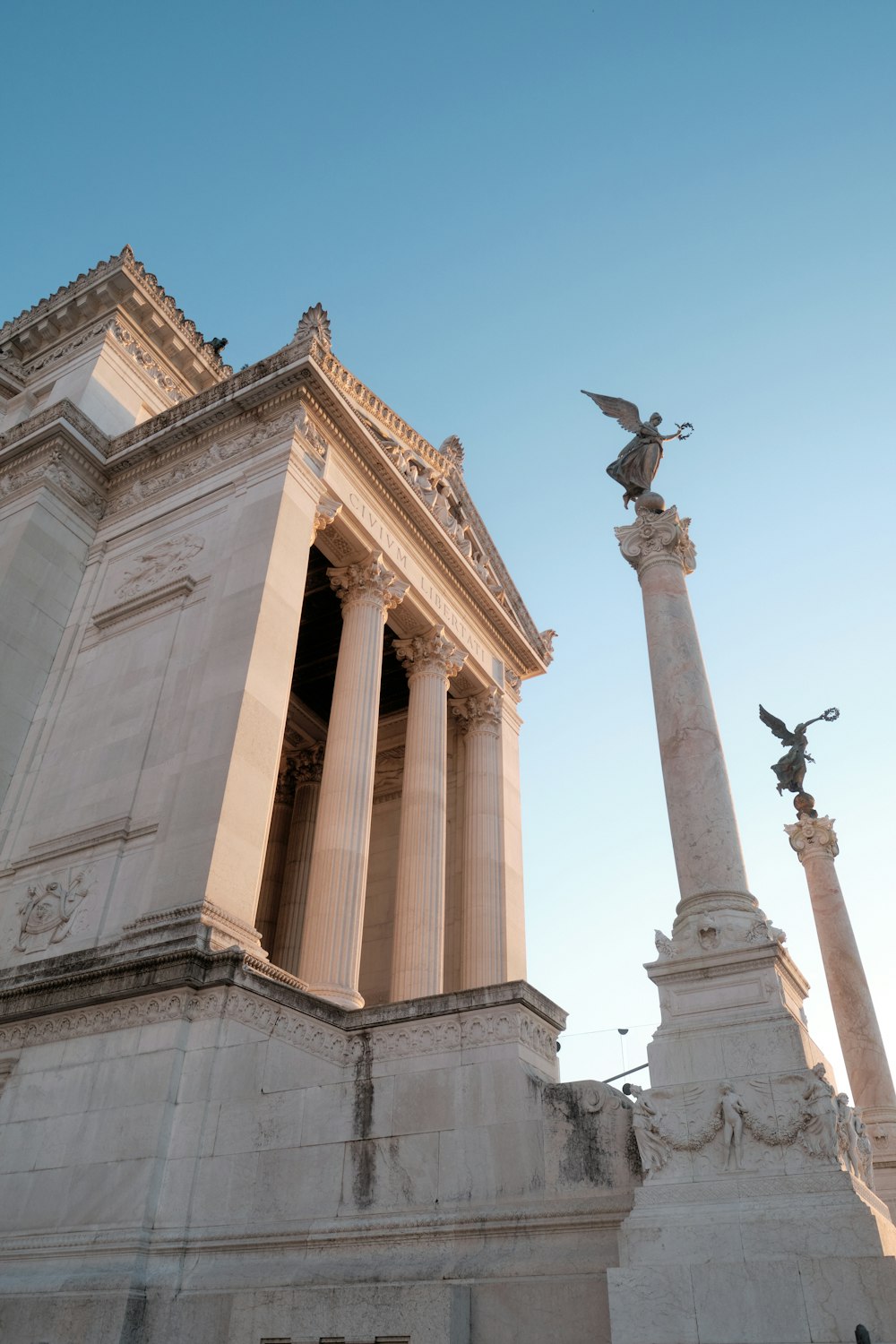 a building with a statue on top