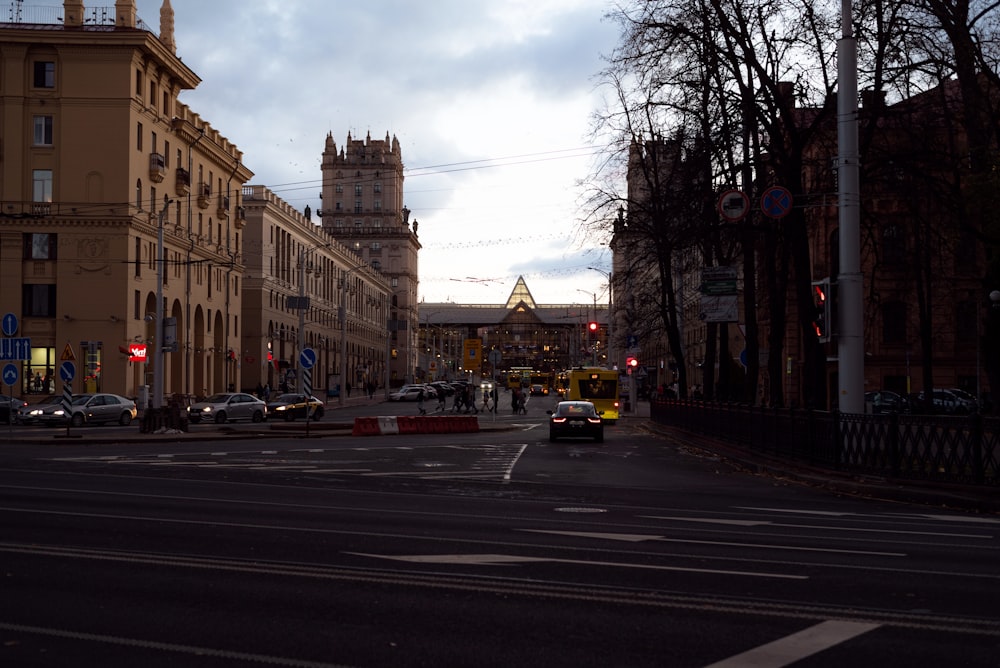 a city street with cars and buildings