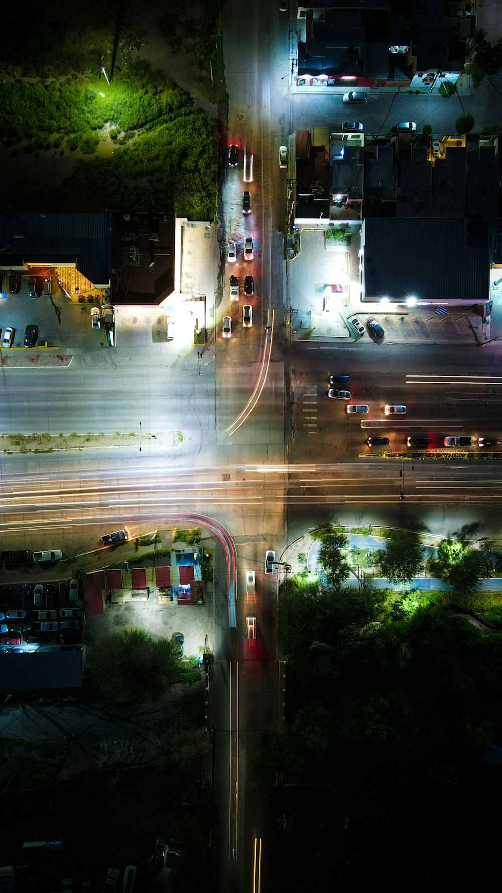 a street with cars and buildings