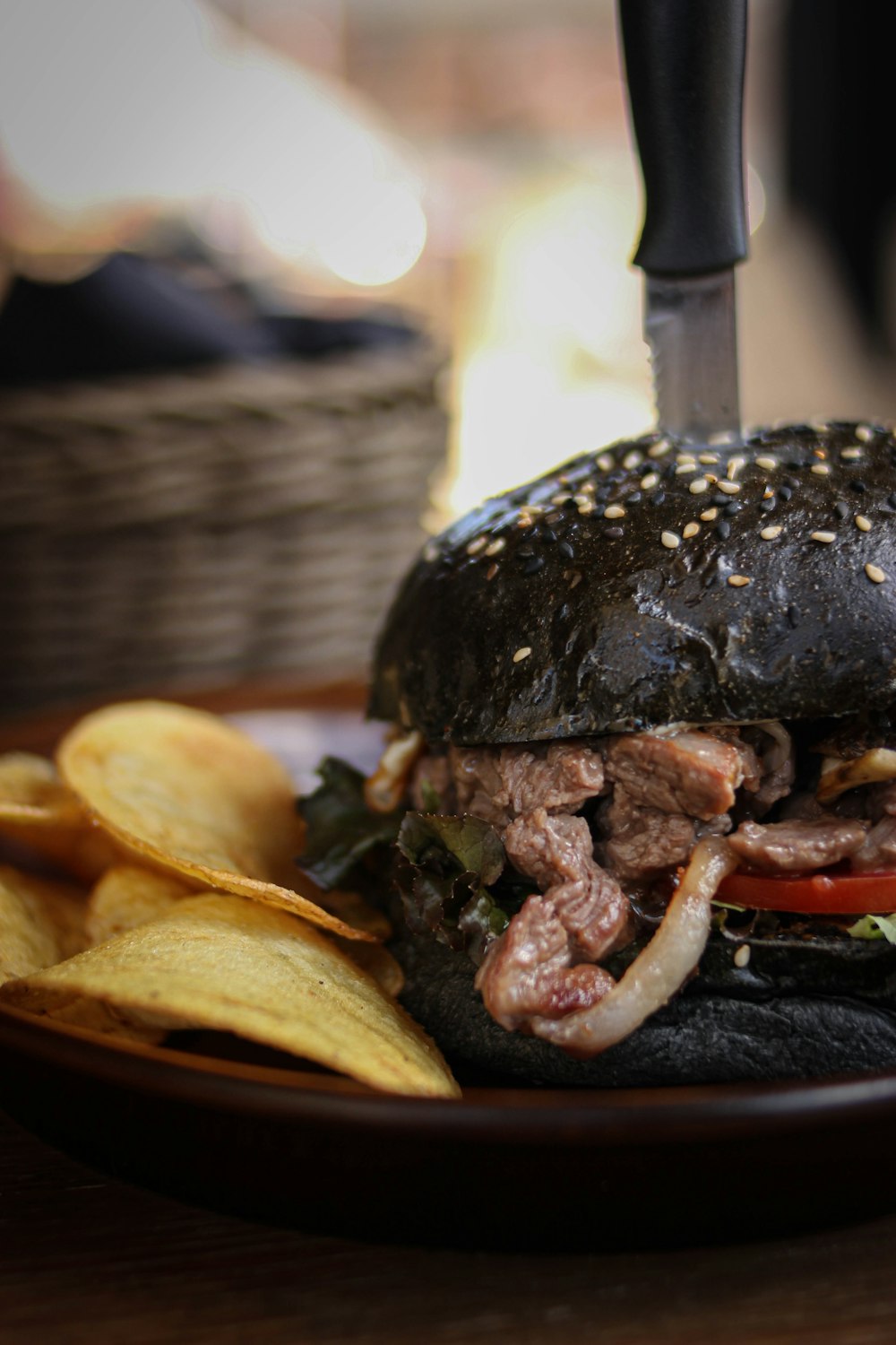 a hamburger with meat and vegetables