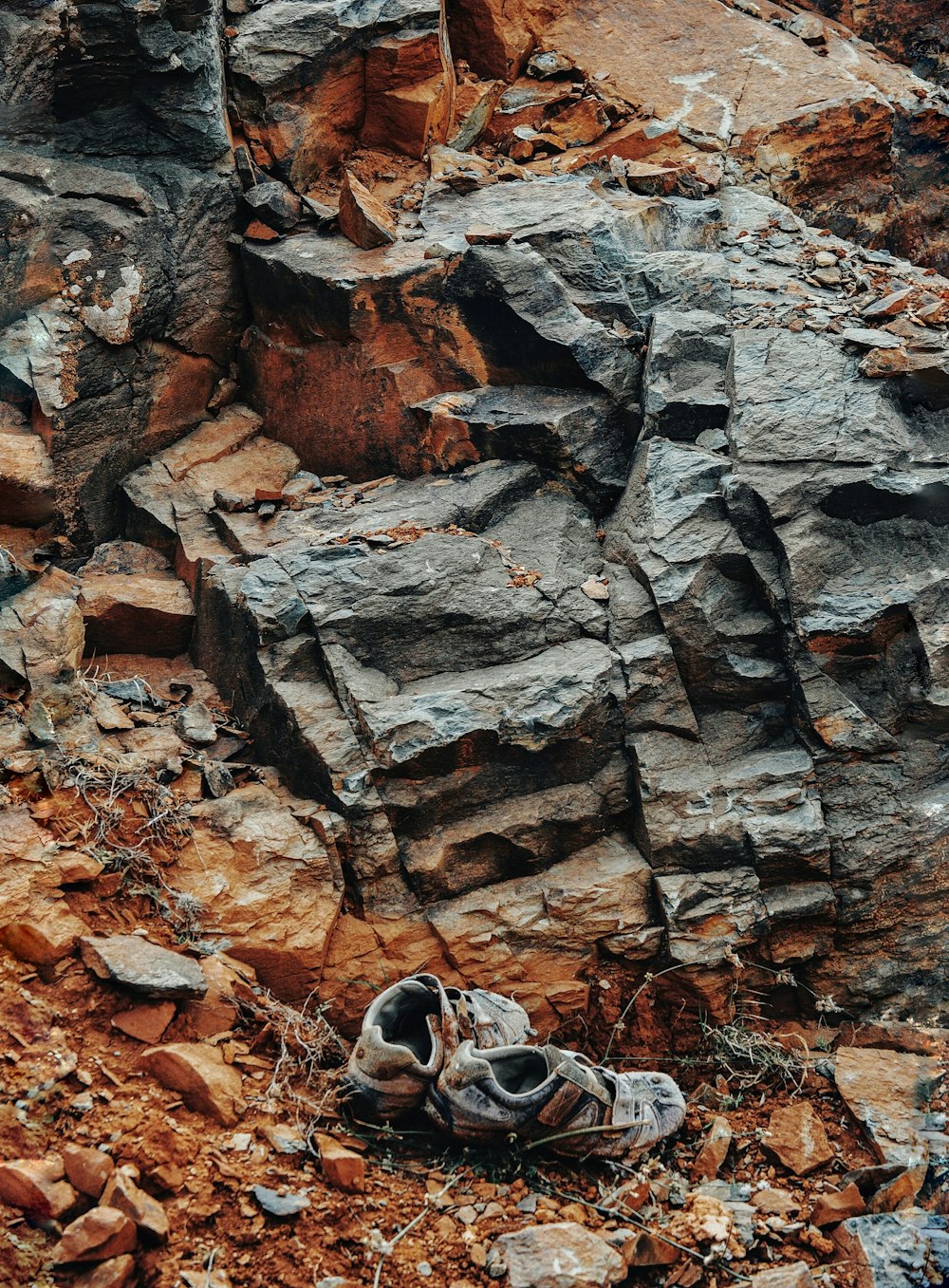 a rock wall with a hole in it