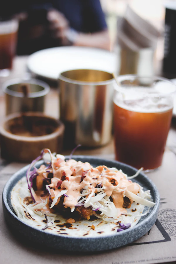 Crispy Baja fish tacos with cabbage slaw and crema