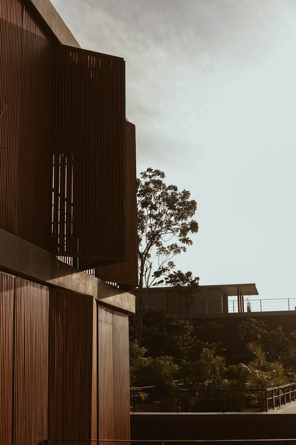 a building with a tree in the background