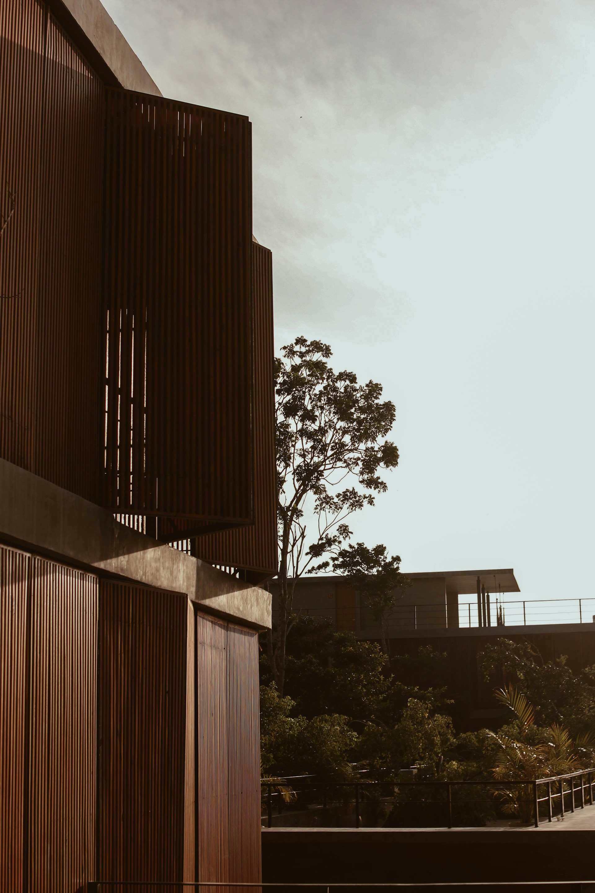 a building with a tree in the background