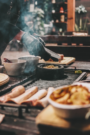 a person making food on a table