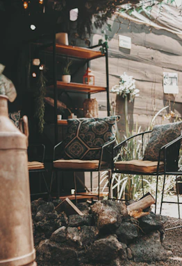 A cozy backyard patio in Castle Rock with an outdoor TV lift cabinet blending seamlessly into the Colorado landscape.