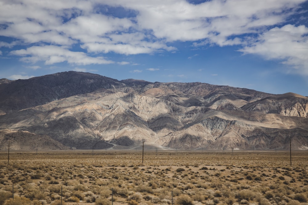 a landscape with hills in the back