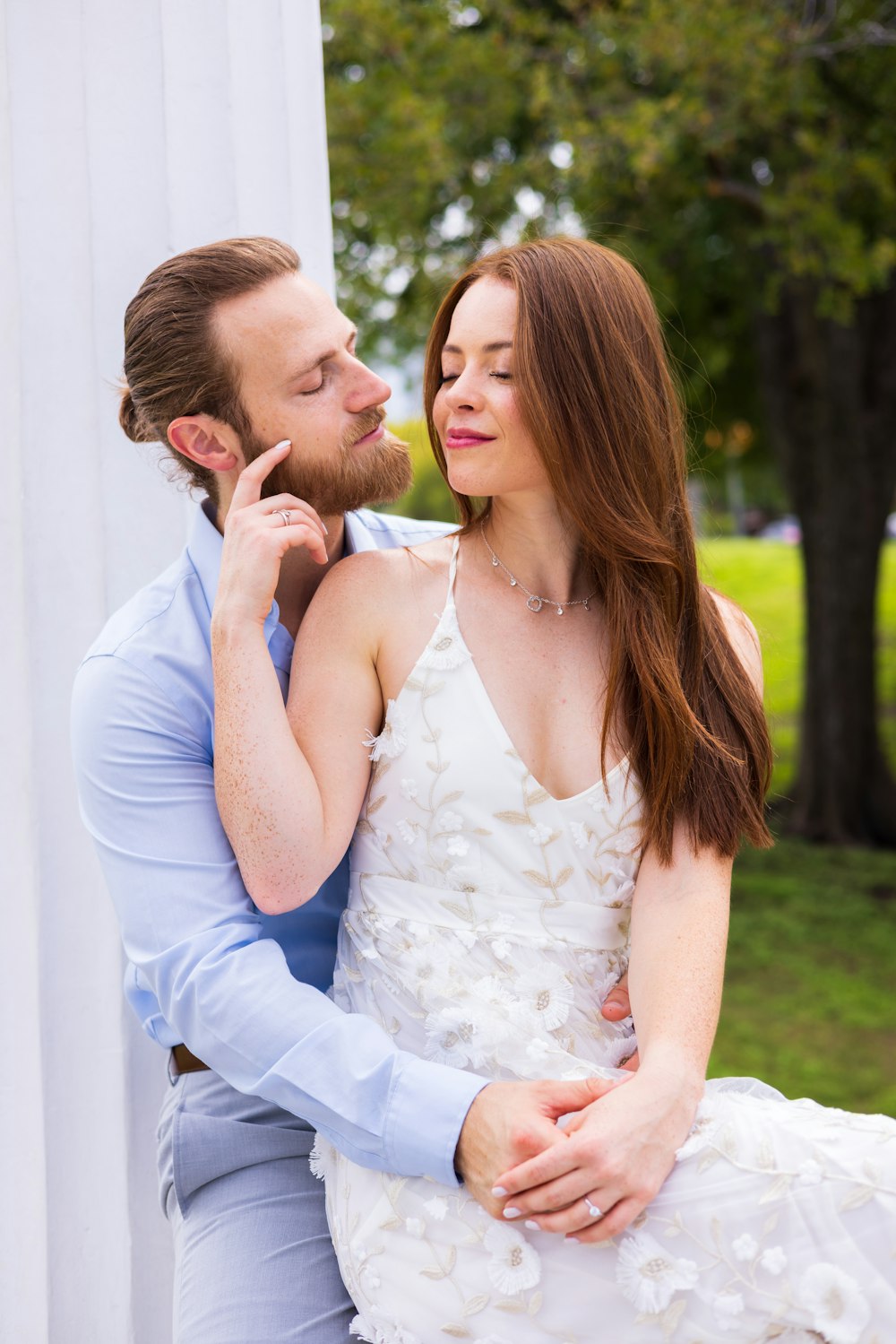 a man and woman kissing