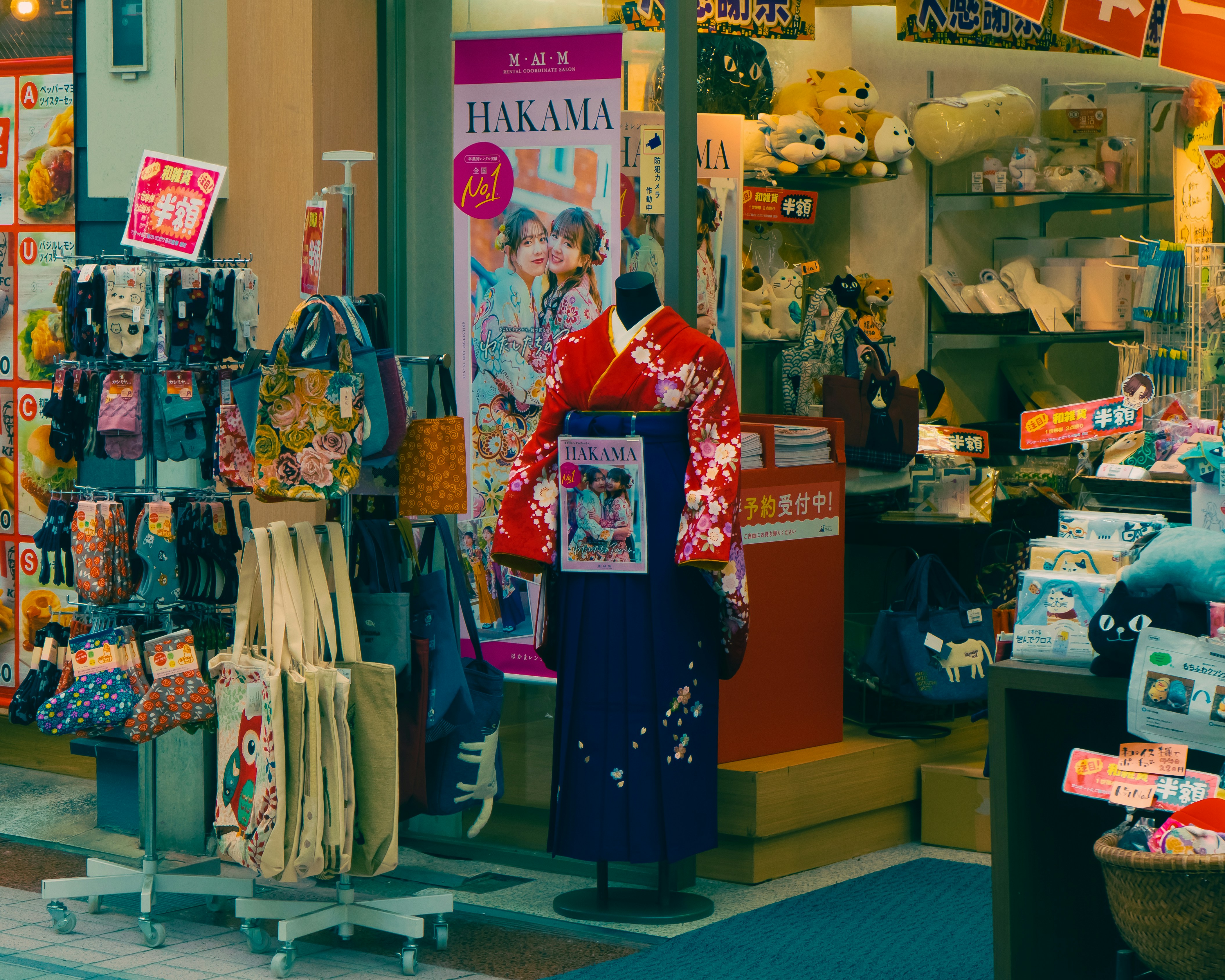 Display of anime merchandise fukubukuro bags at a store entrance
