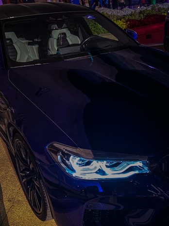 Night view of a clean, comfortable car ready for a late pickup.