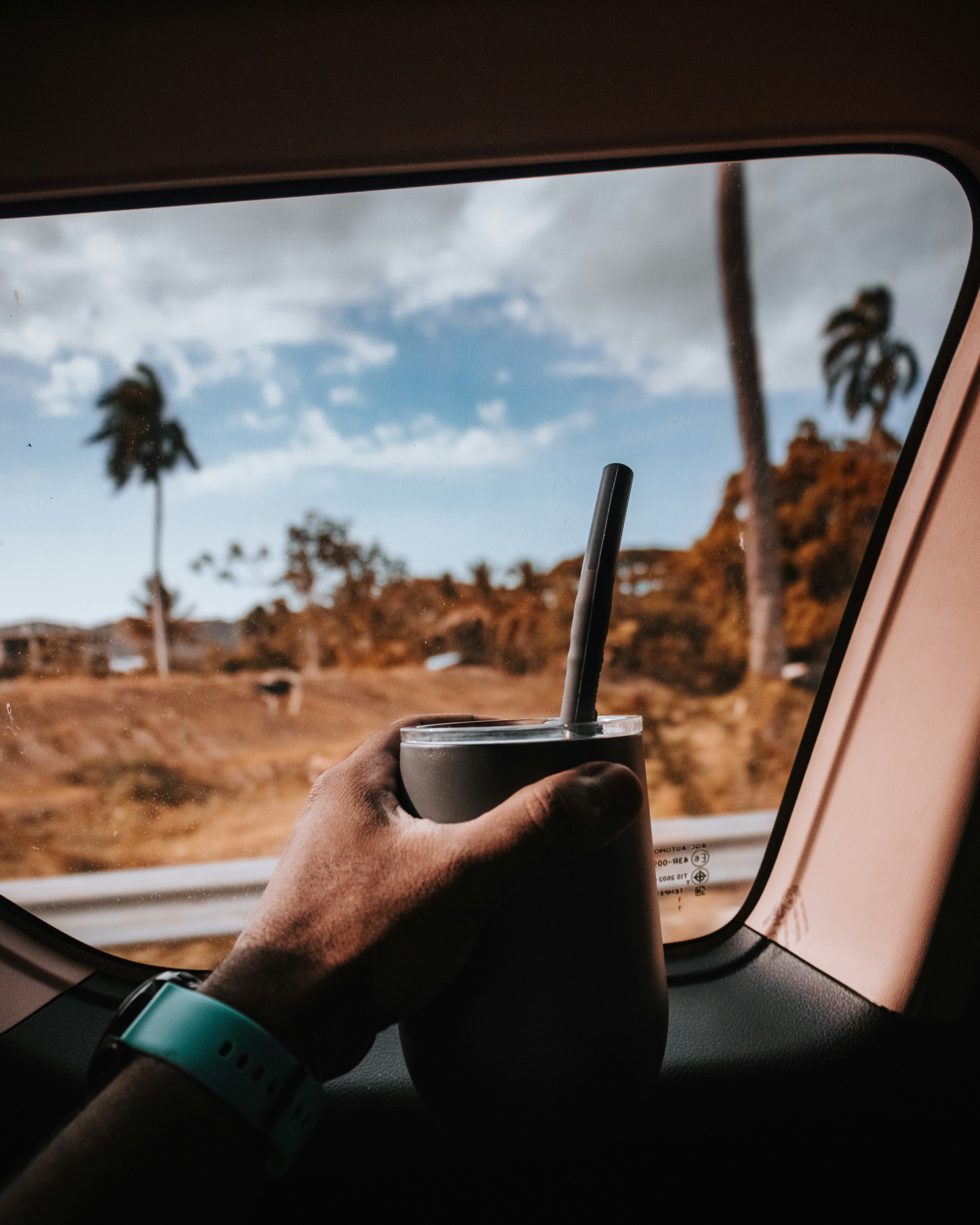 a person holding a knife in a car