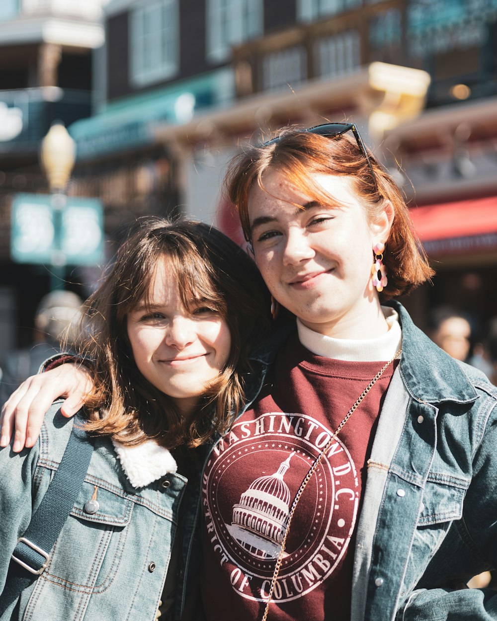 a woman hugging another woman