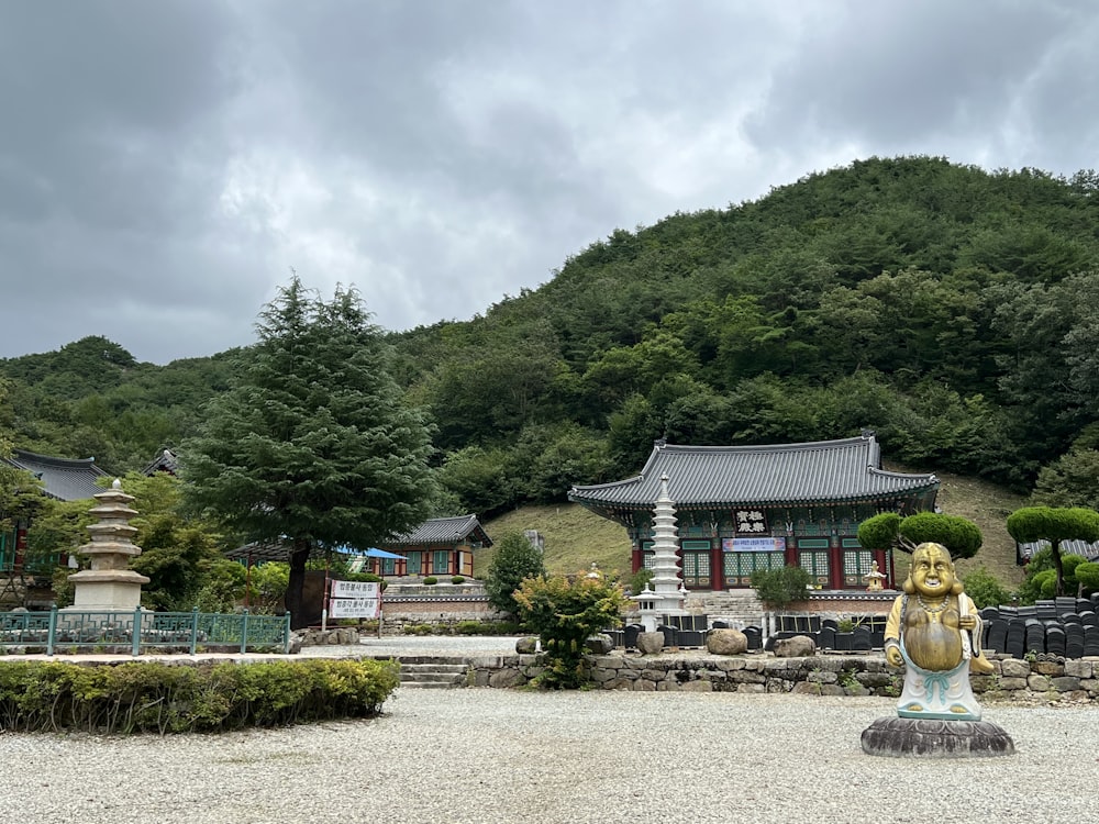 a statue in front of a building