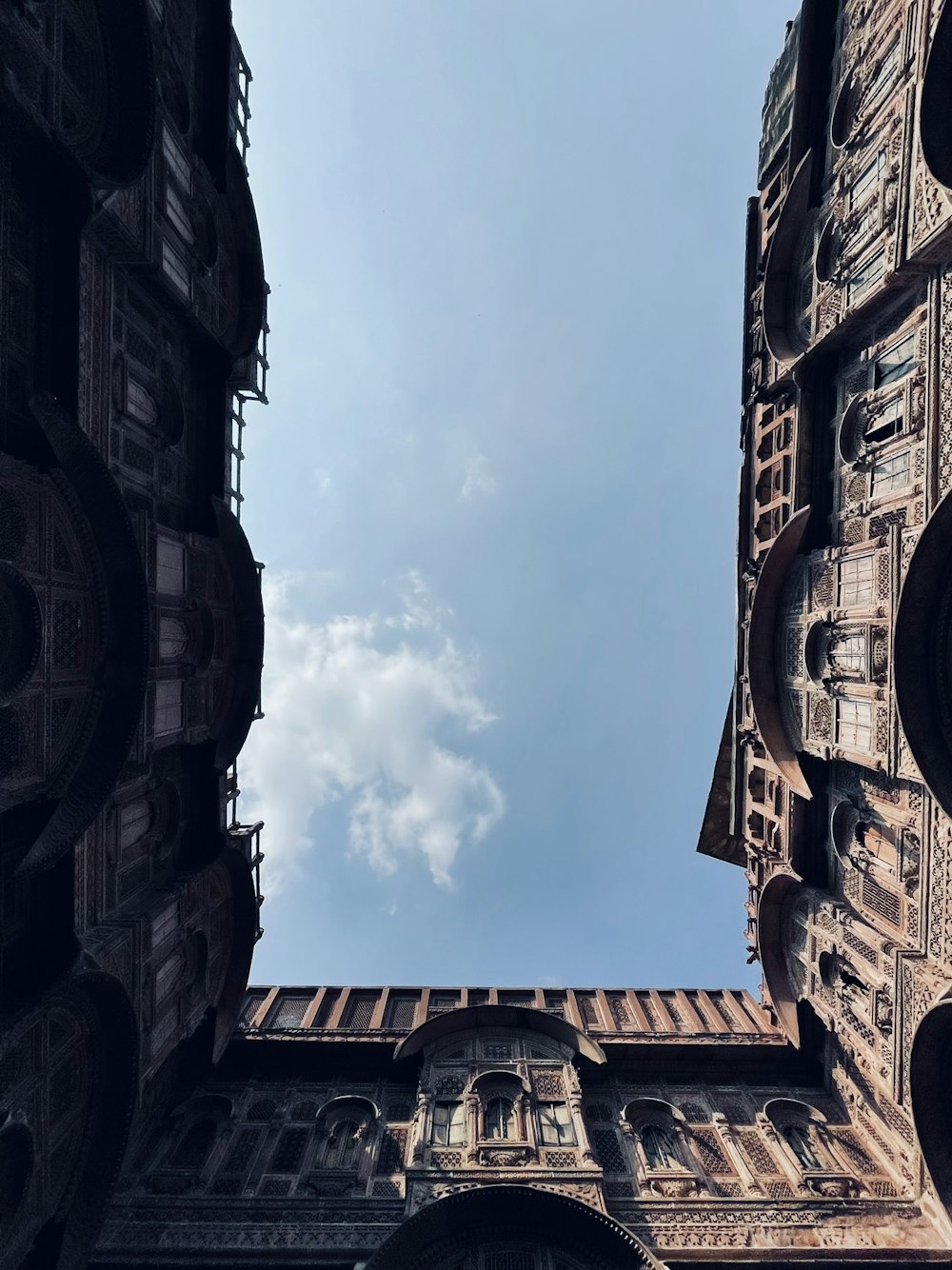 a building with a cloudy sky