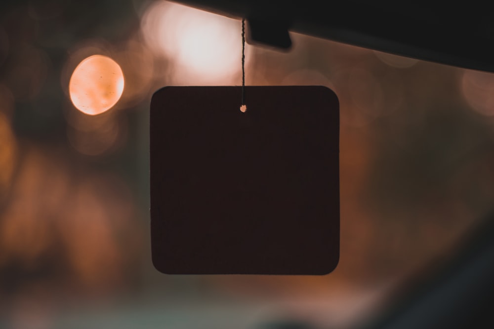 a black speaker on a table