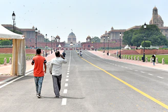 a group of people walking on a road