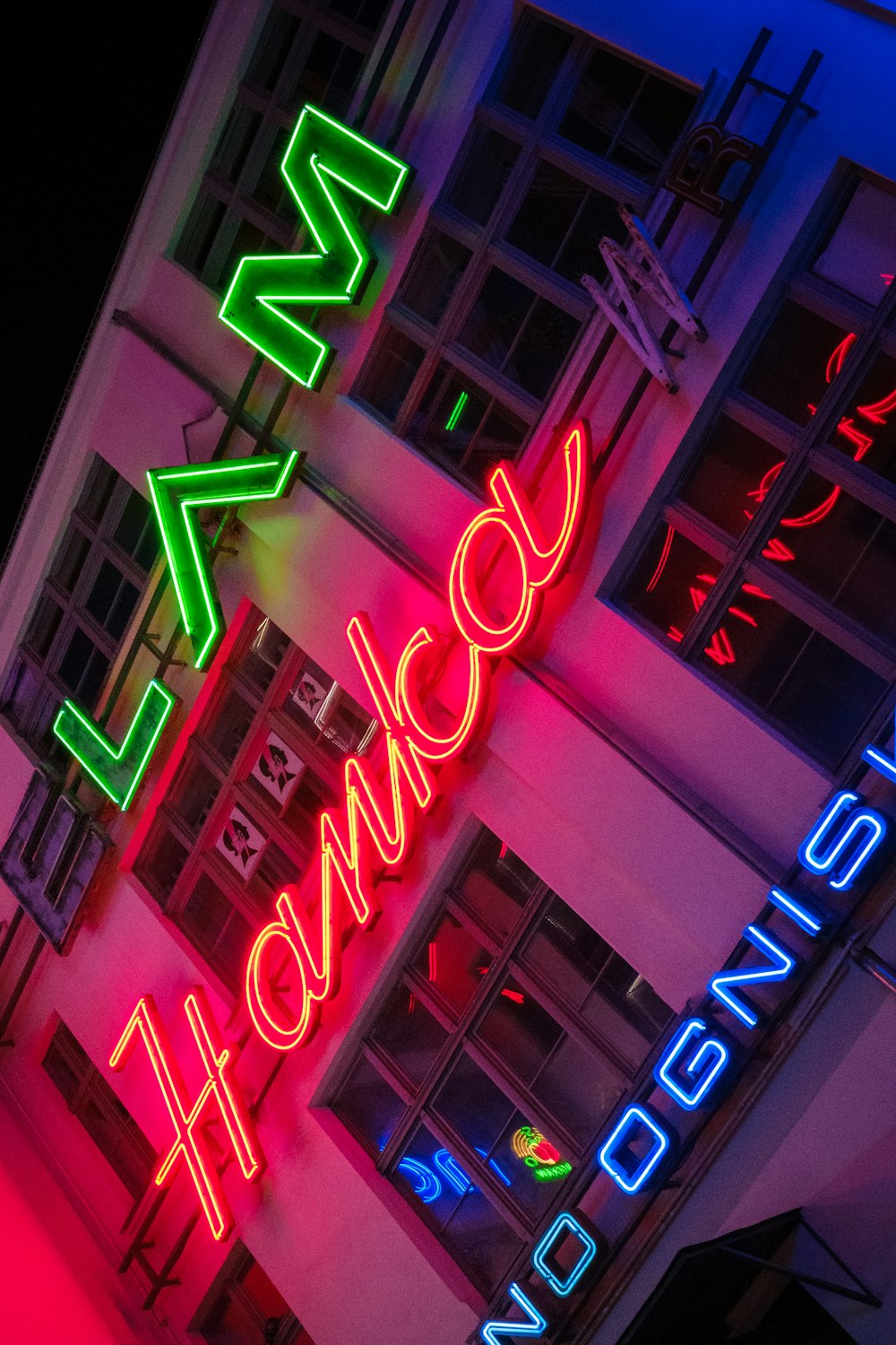 a neon sign on a building