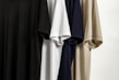 A variety of t-shirts and polos displayed.