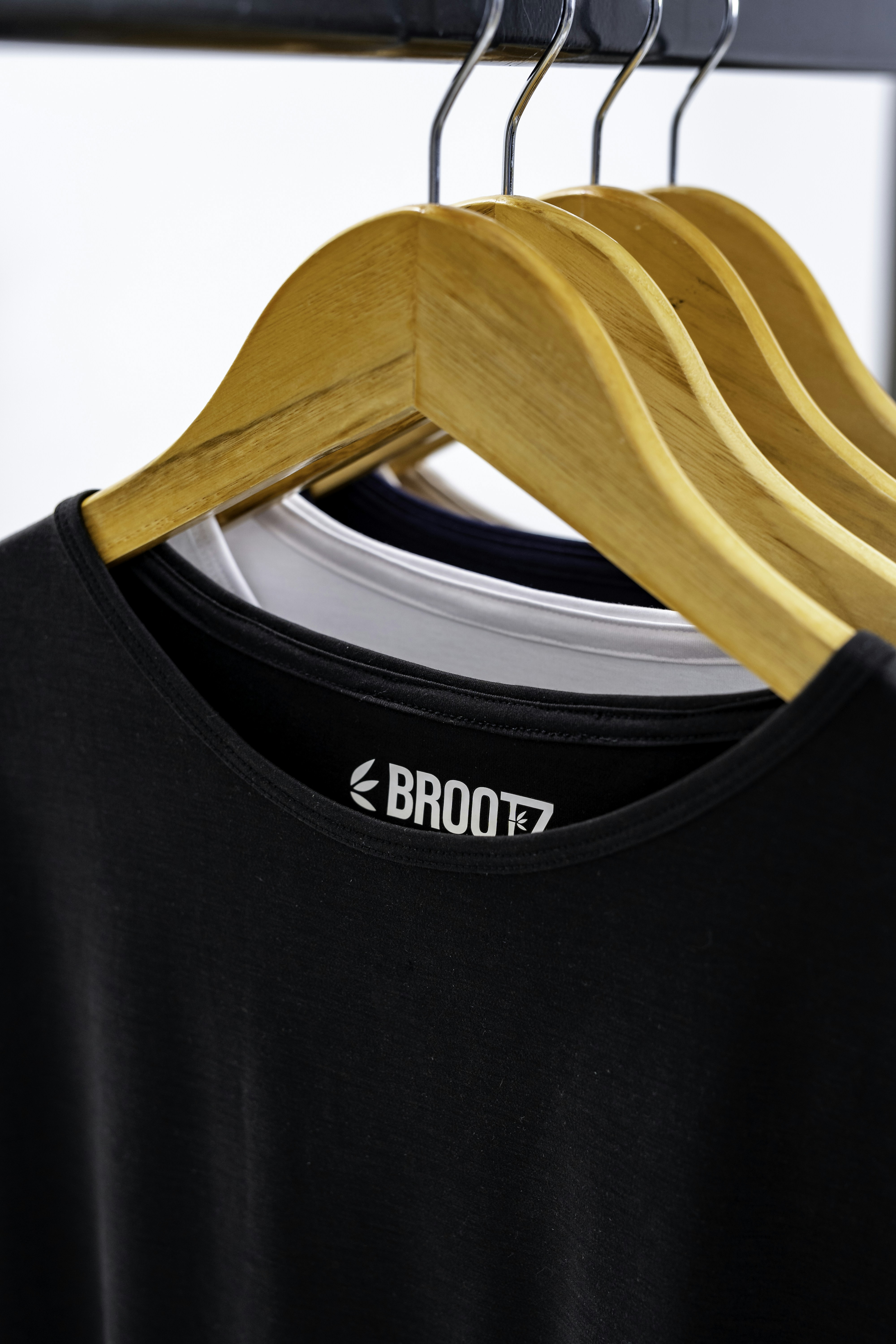 a black speaker with a wooden handle