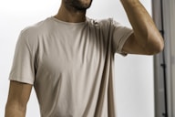 a man wearing a white shirt