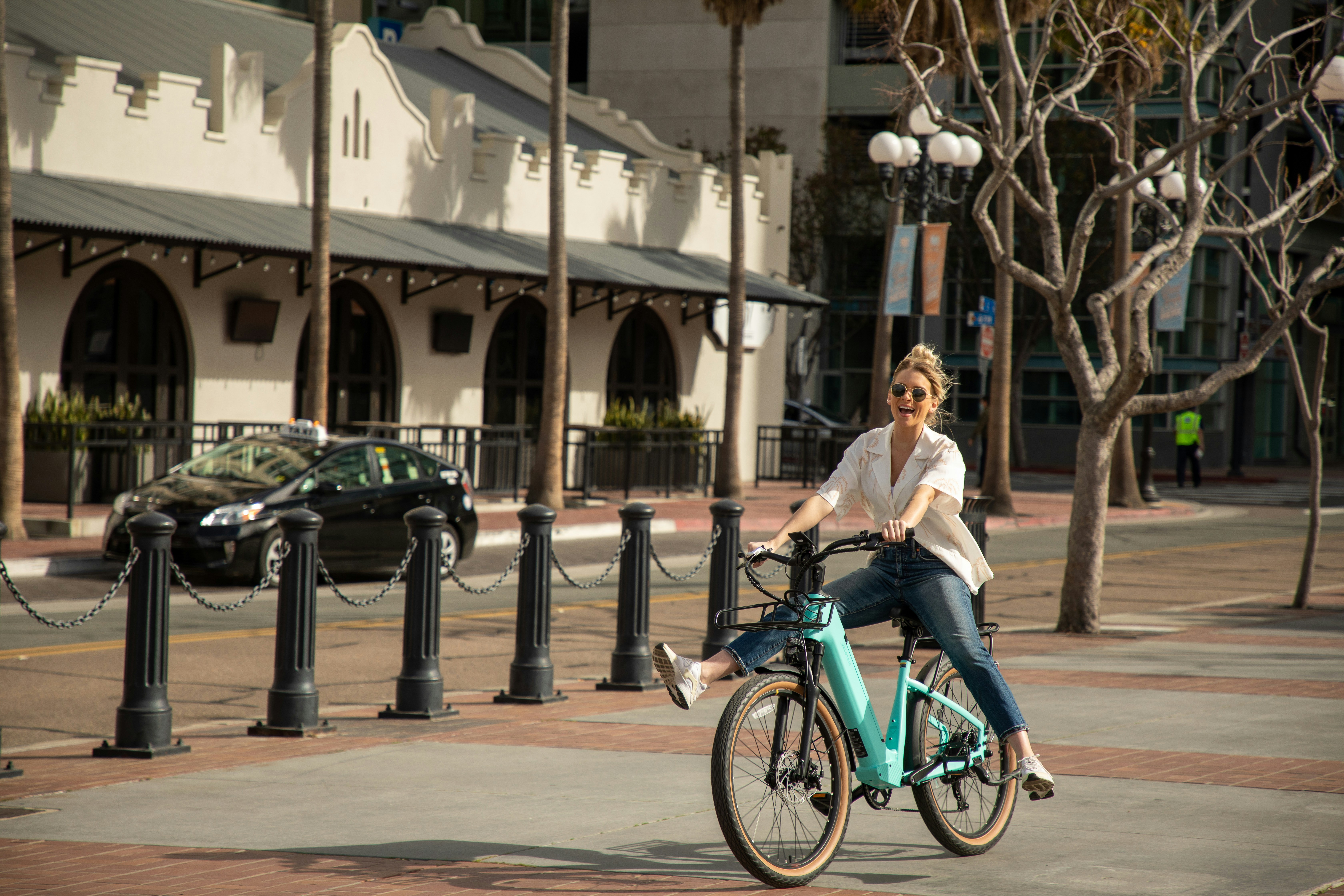 a person riding a bicycle on a street