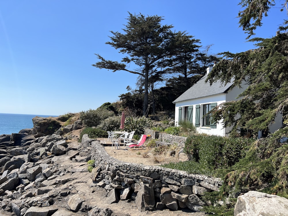 a house on a rocky beach