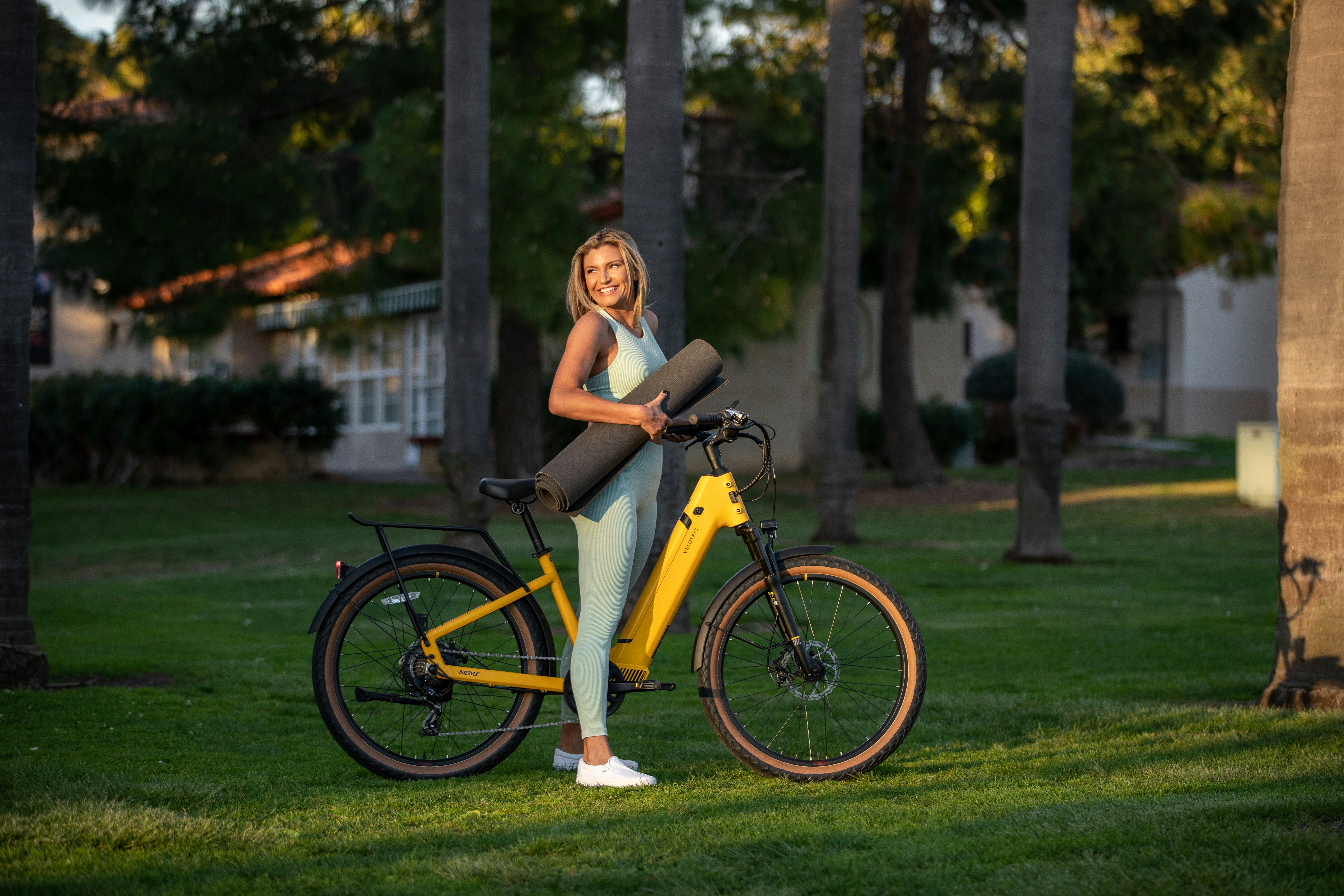 a person standing next to a bicycle