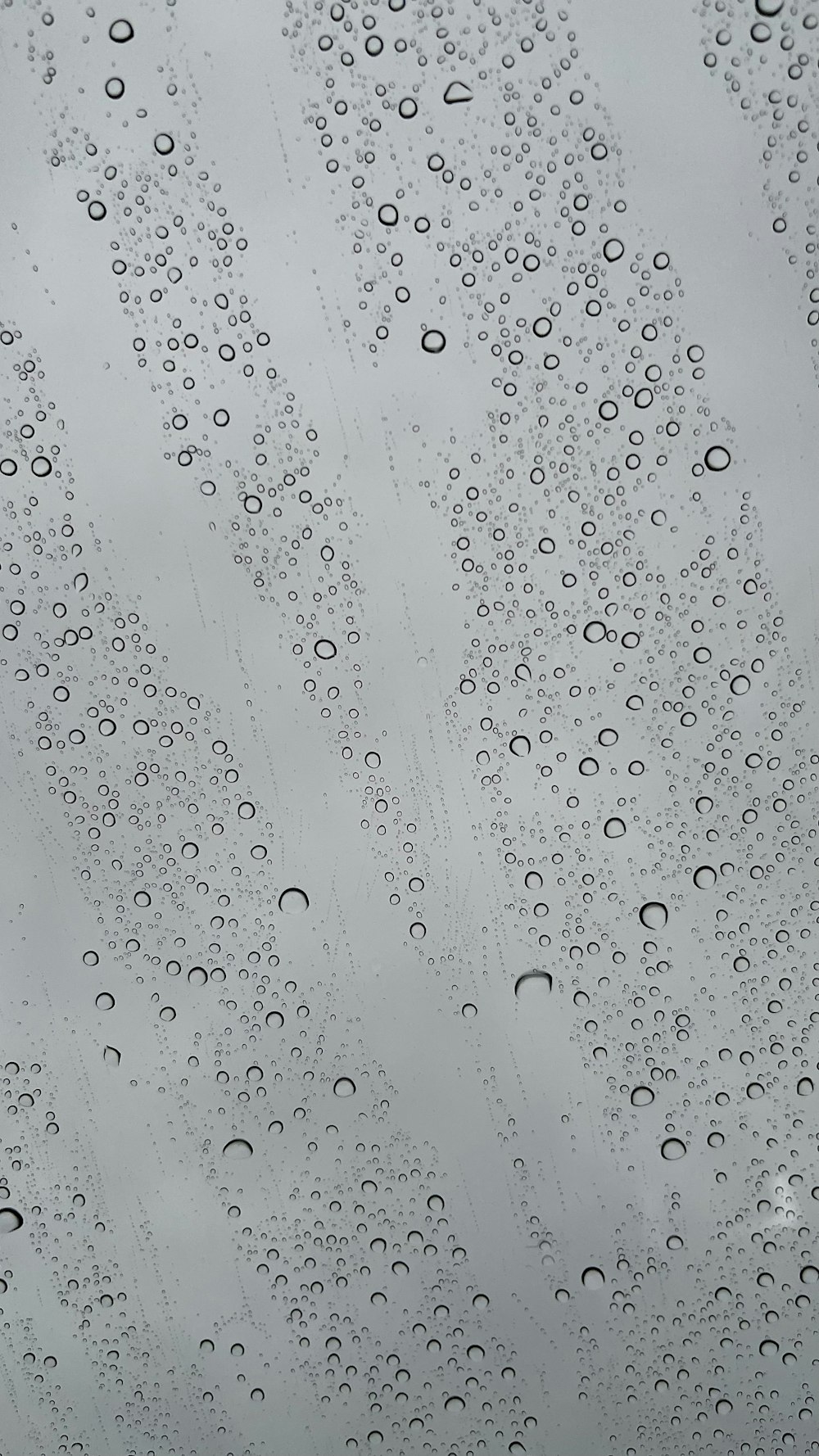 a window with raindrops on it