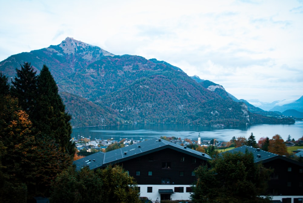 a building with a mountain in the background