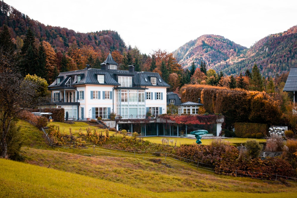 a large house with a lawn in front of it