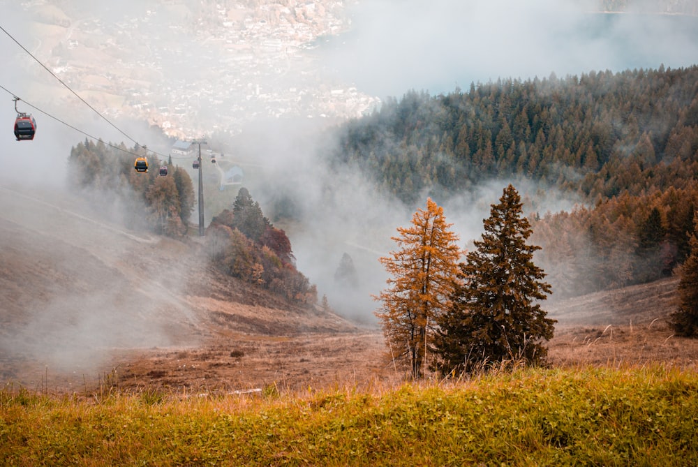 a ski lift going up a hill