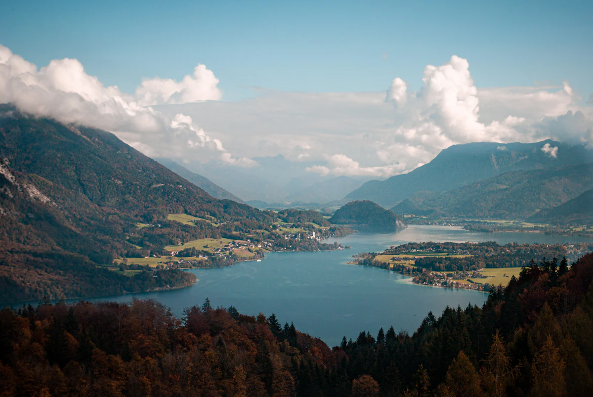 Wolfgangsee near St. Gilgen in autumn, with clouds over the mountains