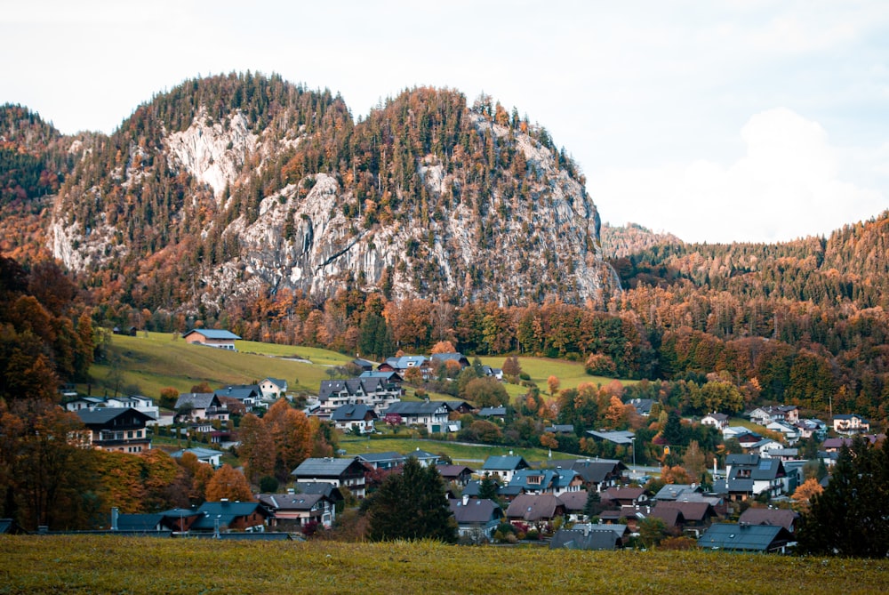 a town below a rocky mountain
