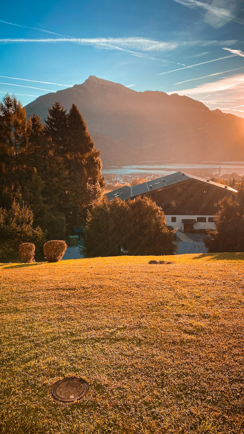 a building with a mountain in the background