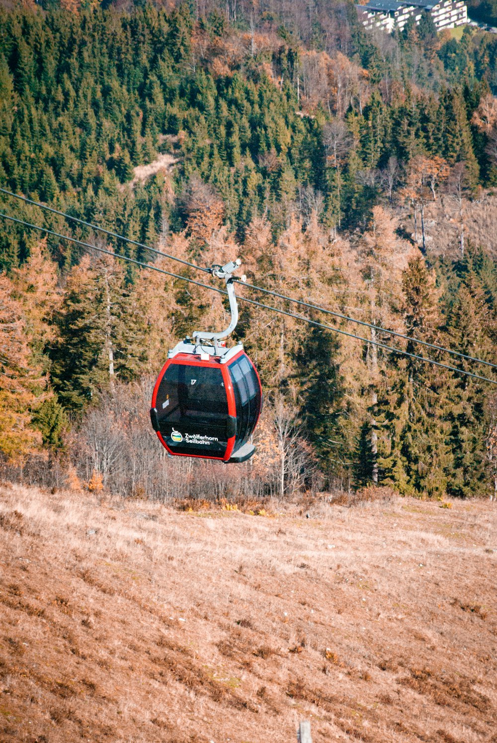 a cable car going up a hill